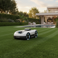Segway Navimow X430 robotic lawn mower on a lush green lawn